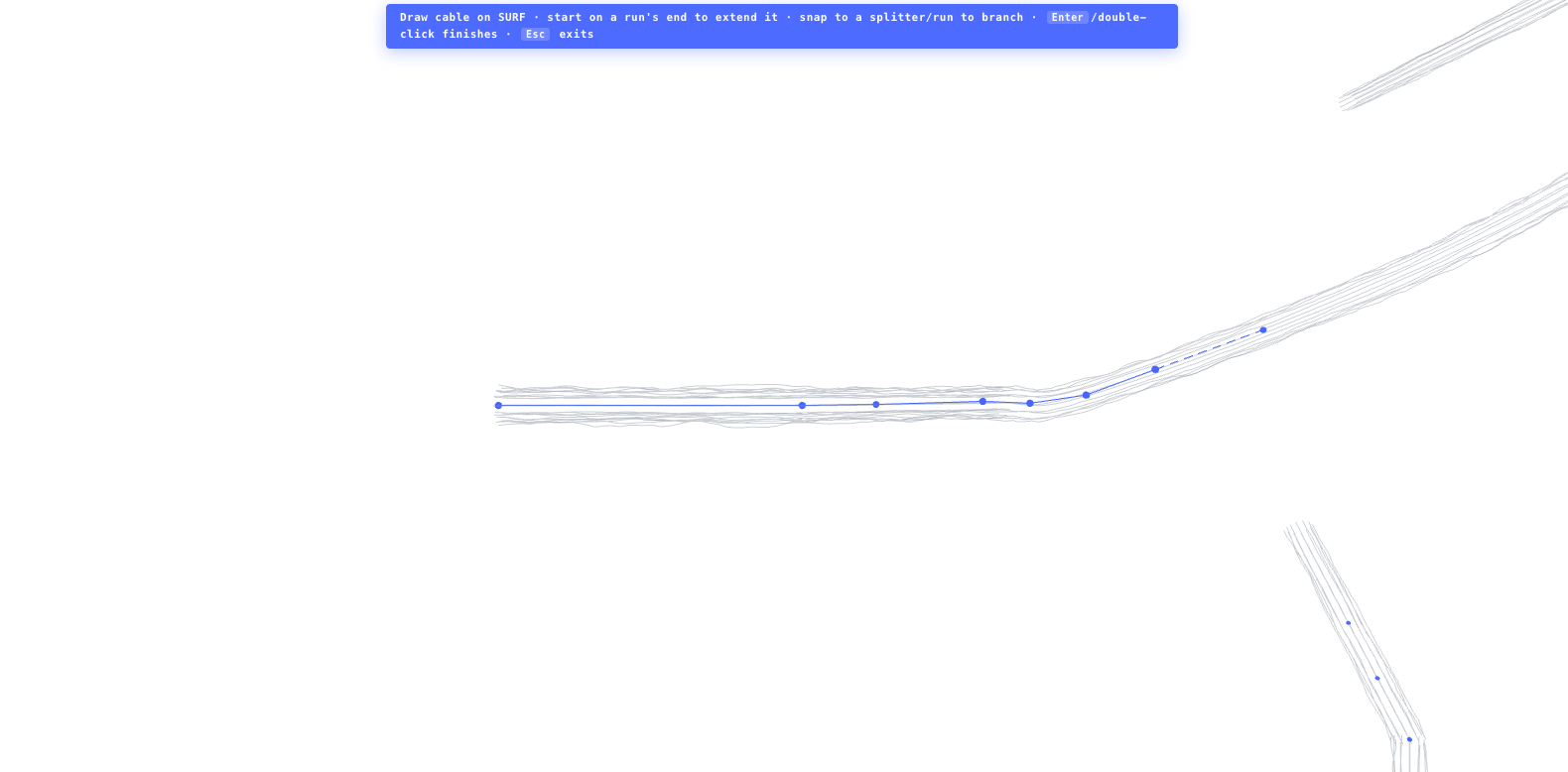 Manual cable design. Draw runs, drop 2/3/4-way splitters that break the run into loss-accounted segments, and set the headend.